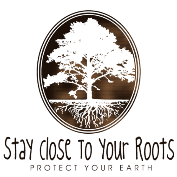 Detail of Stay Close to Your Roots t-shirt design, featuring a cameo with a large tree and a cross section of its roots with the text "stay close to your roots" and "protect your earth" below