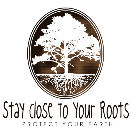 Detail of Stay Close to Your Roots t-shirt design, featuring a cameo with a large tree and a cross section of its roots with the text "stay close to your roots" and "protect your earth" below
