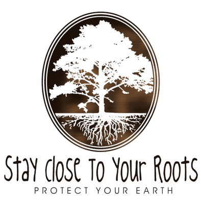 Detail of Stay Close to Your Roots t-shirt design, featuring a cameo with a large tree and a cross section of its roots with the text "stay close to your roots" and "protect your earth" below