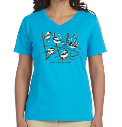 Detail of Chickadees wildlife t-shirt design, showing a small flock of black-capped chickadees resting on branches with winter buds accompanied by the text "Chick-a-dee-dee-delight"